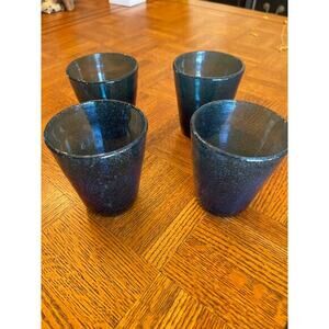 Set up four Neiman Marcus glass tumblers blue